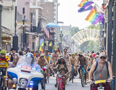 world naked bike ride women|Photos: The World Naked Bike Ride in New Orleans brings。